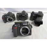 FOUR DIGITAL SLR CAMERA BODIES INCLUDING NIKON D40 TOGETHER WITH D60,