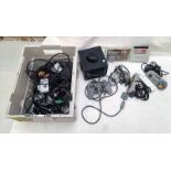 NINTENDO GAMECUBE CONSOLE TOGETHER WITH SUPER NINTENDO CONTROLLERS, GAMECUBE MEMORY CARD AND OTHERS.
