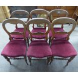 SET OF 6 19TH CENTURY MAHOGANY CHAIRS WITH DECORATIVE CARVED BELTING ON SPLAYED SUPPORT.