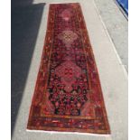 THE PERSIAN COMPANY IRANIAN RUNNER WITH RED & BLACK PATTERN,