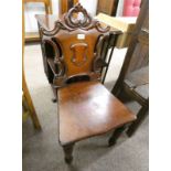19TH CENTURY MAHOGANY HALL CHAIR WITH DECORATIVE CARVED BACK ON TURNED SUPPORTS