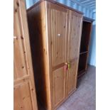 PINE 2 DOOR WARDROBE ON BUN FEET,