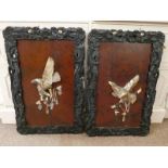 PAIR OF CARVED ORIENTAL PANELS WITH CARVED HARDWOOD FRAMES INSET WITH MOTHER OF PEARL & BONE EAGLES