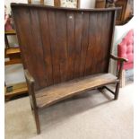 18TH CENTURY OAK BENCH WITH PANELLED BACK ON SQUARE SUPPORTS.