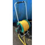 GARDEN WATER HOSE ON REEL Condition Report: The item appears to be typical used
