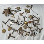 SELECTION OF VARIOUS CLOCK WINDING KEYS AND PENDULUMS IN ONE BOX