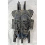 AFRICAN DOUBLE HEADED SENUFO POWER MASK OF CARVED FORM,