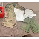 SELECTION OF MILITARY LIKE CLOTHING TO INCLUDE TROPICAL SHORTS AND T - SHIRTS,