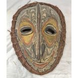 SEPIK RIVER MASK OF CARVED FORM WITH WICKER SURROUND,