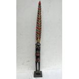 HAND CARVED AND PAINTED TRIBAL FIGURE,