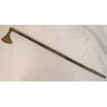 INDIAN STYLE AXE WITH DECORATED HEAD ON A CARVED WOODEN SHAFT,
