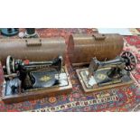 2 SINGER SEWING MACHINES, BOTH WITH HOODS,