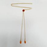 LATE 19TH OR EARLY 20TH CENTURY GOLD CARNELIAN SET LONG CHAIN WITH PEAR SHAPE DROPS - 53CM LONG,