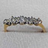 18CT GOLD 5-STONE DIAMOND RING. VERY APPROX. 0.