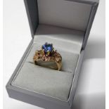 9CT GOLD GEM SET RING WITH TEXTURED MOUNT - 6G