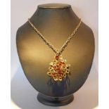 9CT GOLD CITRINE SET CONTEMPORARY PENDANT ON A 9CT GOLD CHAIN - PENDANT 6.5 CM LONG, 27.