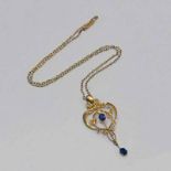 EARLY 20TH CENTURY 9CT GOLD AMETHYST PENDANT ON A 9CT GOLD CHAIN