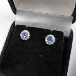 PAIR 18CT GOLD DIAMOND AND ZIRCON CLUSTER EARSTUDS Condition Report: Diamonds are