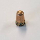 GOLD 2-TONE THIMBLE STUDDED WITH TURQUOISE & DECORATED WITH FOLIATE DECORATION - 5.