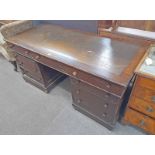 19TH CENTURY LEATHER INSET MAHOGANY TWIN PEDESTAL DESK WITH 9 DRAWERS ON BUN FEET .