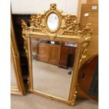 DECORATIVE CARVED GILT FRAME MIRROR WITH BEVELLED EDGE,