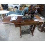 MAHOGANY SINGER SEWING TABLE WITH FOLD-OUT MACHINE ON TREADLE BASE, MACHINE NO.