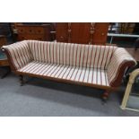 19TH CENTURY MAHOGANY ROLL ARM SETTEE ON TURNED SUPPORTS