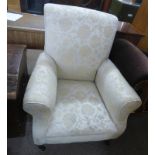 EARLY 20TH CENTURY OVERSTUFFED ARMCHAIR ON SQUARE TAPERED SUPPORTS