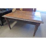 19TH CENTURY OAK KITCHEN TABLE WITH DECORATIVE CARVED BORDER ON DECORATIVE TURNED SUPPORTS.