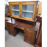 19TH CENTURY MAHOGANY DRESSER WITH SHELVED INTERIOR BEHIND 2 GLAZED PANEL DOORS OVER BASE OF 1