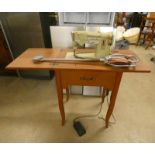 SINGER SEWING TABLE WITH FOLD OUT MACHINE & SHOOTING STICK