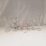 4 18TH CENTURY FOLDED FOOT GLASSES & 2 OTHER GLASSES Condition Report: 5 of the 6