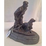 BRONZE FIGURES OF MAN & DOG ON HARDSTONE BASE