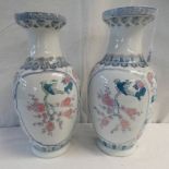 PAIR OF BLUE, WHITE AND PINK ORIENTAL STYLE BALUSTER VASES WITH BIRD AND FLORAL DECORATION.