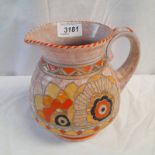 CROWN DUCAL PAINTED JUG WITH FLORAL AND PATTERNS DECORATION, SIGNED CHARLOTTE RHEAD .