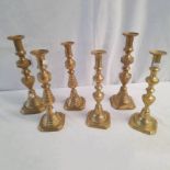 6 VARIOUS SIZED BRASS CANDLESTICKS,