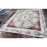 RED AND CREAM FLORAL DECORATED CARPET - **** SOLD PLUS VAT ON THE HAMMER PRICE