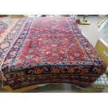 RED GROUND HAND WOVEN PERSIAN SAROUK RUG WITH ALL OVER UNIQUE DESIGN 200 X 110CM
