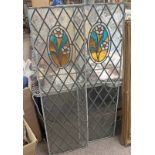 TWO LEADED GLASS PANELS WITH COLOURED GLASS FLORAL SCENES.