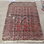 RED MIDDLE EASTERN CARPET.