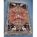 MIDDLE EASTERN RUG 165 CM X 108 CM Condition Report: Sun faded.