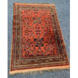 RED MIDDLE EASTERN RUG.