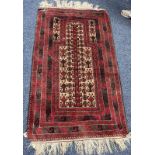 RED MIDDLE EASTERN RUG 155 CM X 90 CM