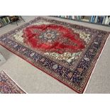 RED GROUND PERSIAN TABRIZ CARPET WITH UNIQUE MEDALLION DESIGN 245 X 350CM