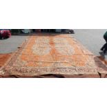 PERSIAN CARPET WITH ORANGE AND CREAM PATTERN - LENGTH 596 CM X 404 CM Condition Report: