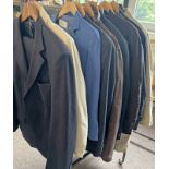 13 COAT HANGERS WITH MENS GARMENTS SUCH AS JACKETS,