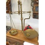 SET OF BRASS BEAM SCALES WITH BRASS PANS & SOME BRASS WEIGHTS ON A WOODEN BASE