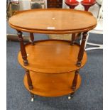 MAHOGANY 3 TIER WHAT-NOT WITH OVAL TOP ON TURNED SUPPORTS,