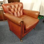 OVER STUFFED RED LEATHER BUTTON BACK ARMCHAIR Condition Report: The lot has use