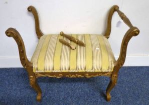 GILT PIANO STOOL WITH SCROLL ARMS ON CABRIOLE SUPPORTS